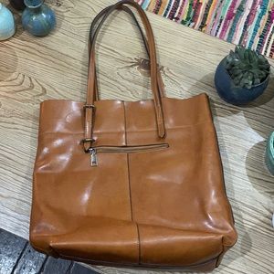Leather tote bag! Very roomy - interior pockets and zippered top